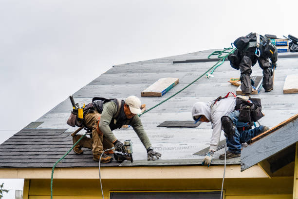 Professional Gutter Installation technician working in Red Hill, PA